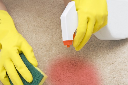 Professional cleaners working in a Barnet home interior