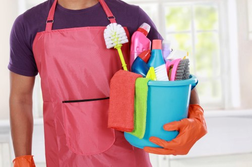Technician preparing a safe carpet cleaning job in Barnet