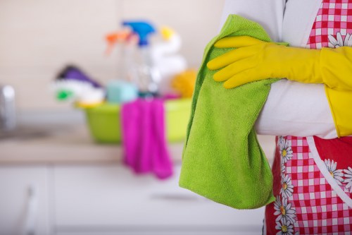 Cleaner dusting and restoring a Barnet property with one off cleaning