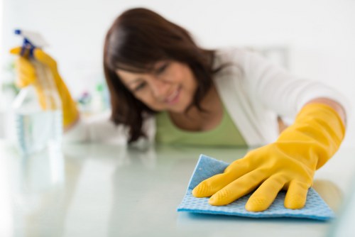 Dusting and vacuuming during house cleaning in Barnet